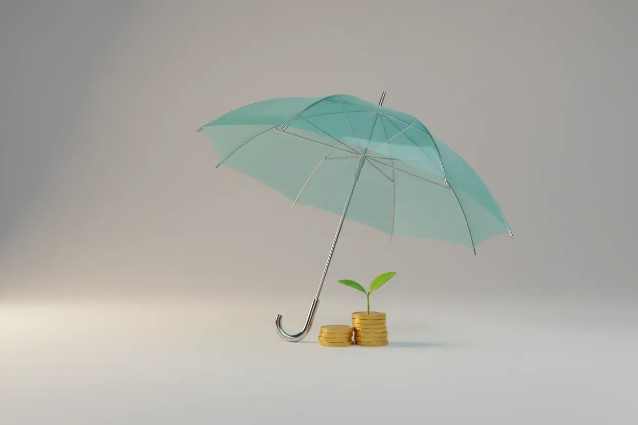 Translucent umbrella sheltering a small stack of coins with a green sprout on a soft neutral background.