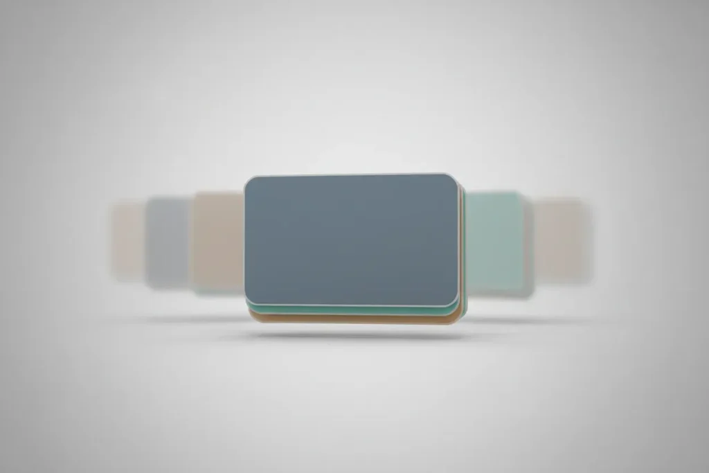 Centered stack of three rounded cards on a soft gradient; faint extra cards fade behind, symbolizing a simplified benefits lineup.